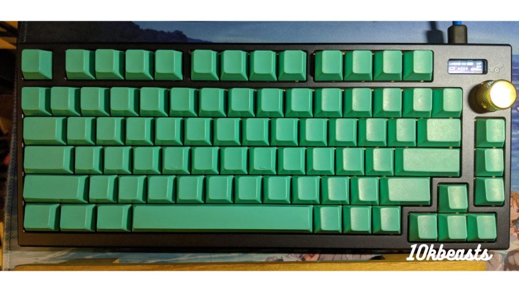 a keyboard with green keycaps